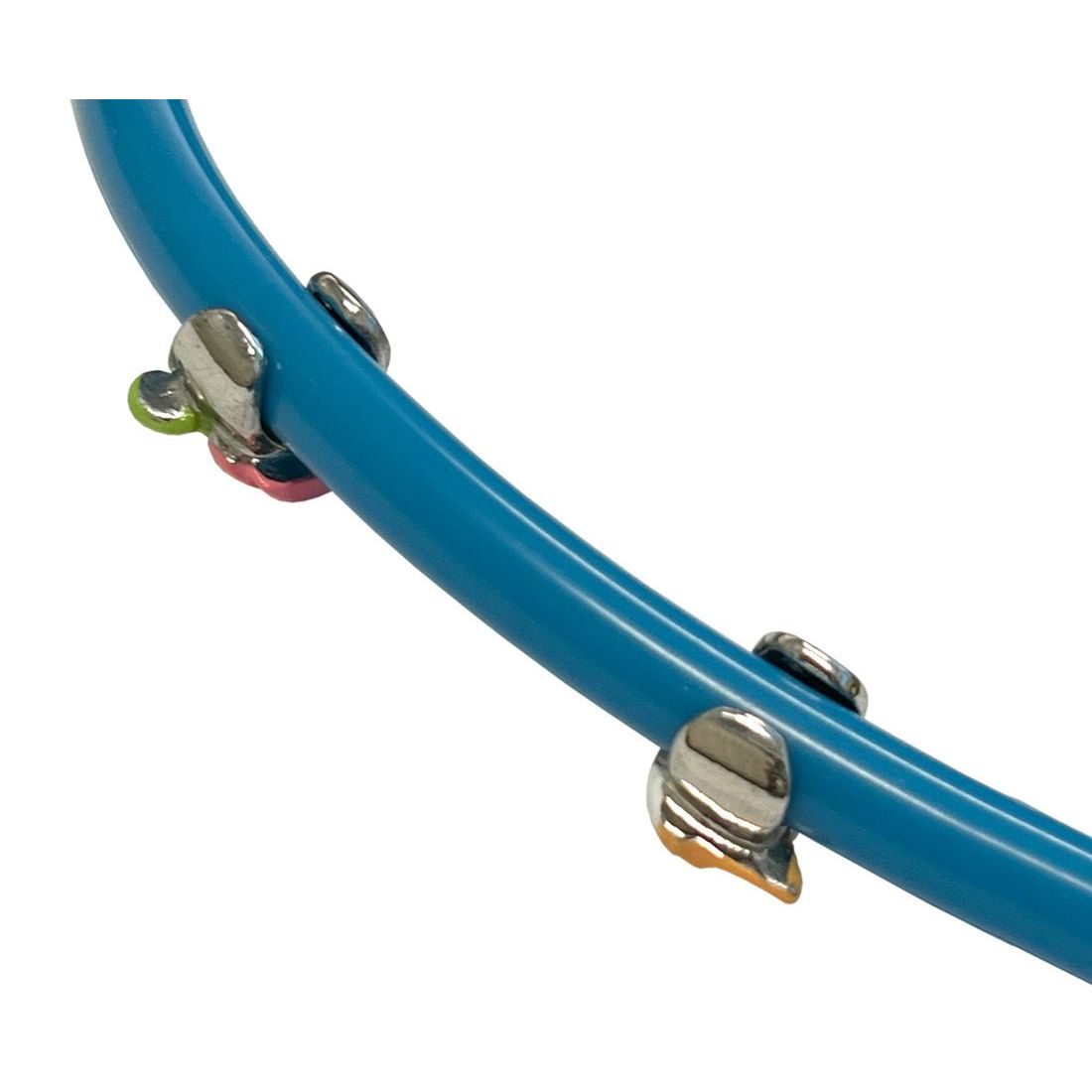 Close-up of a blue tube with metal clamps on a white background - okotoks hc pharmacy