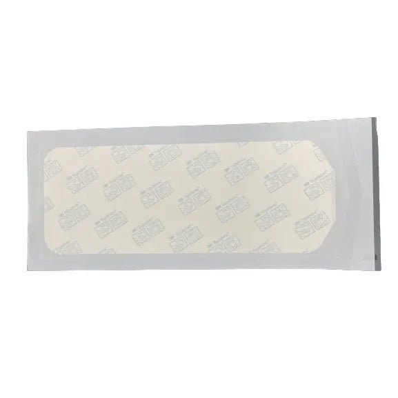Bandage in a clear plastic packaging on a white background - okotoks hc pharmacy