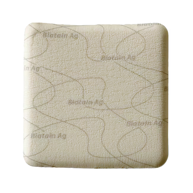 Beige textured square object with 'Biotain AG' branding on a white background - okotoks hc pharmacy
