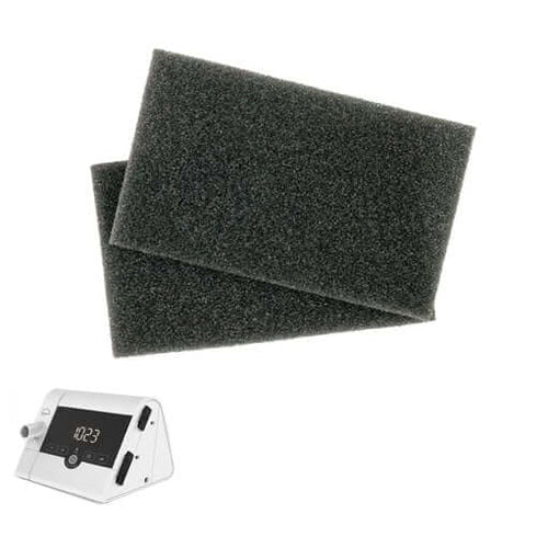 Two black foam filters on a white background with a cpap machine - okotoks hc pharmacy