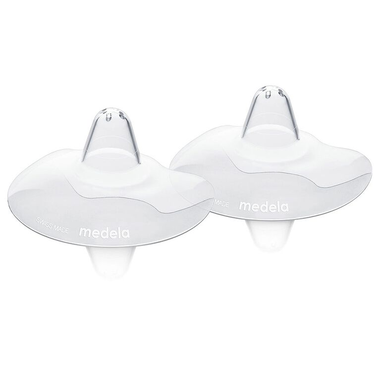Two white Medela breastshields on a white background - okotoks hc pharmacy