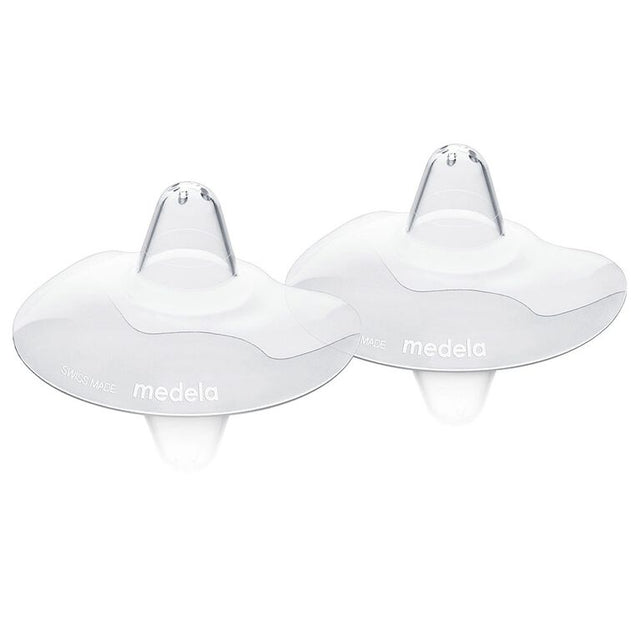 Two white Medela breastshields on a white background - okotoks hc pharmacy