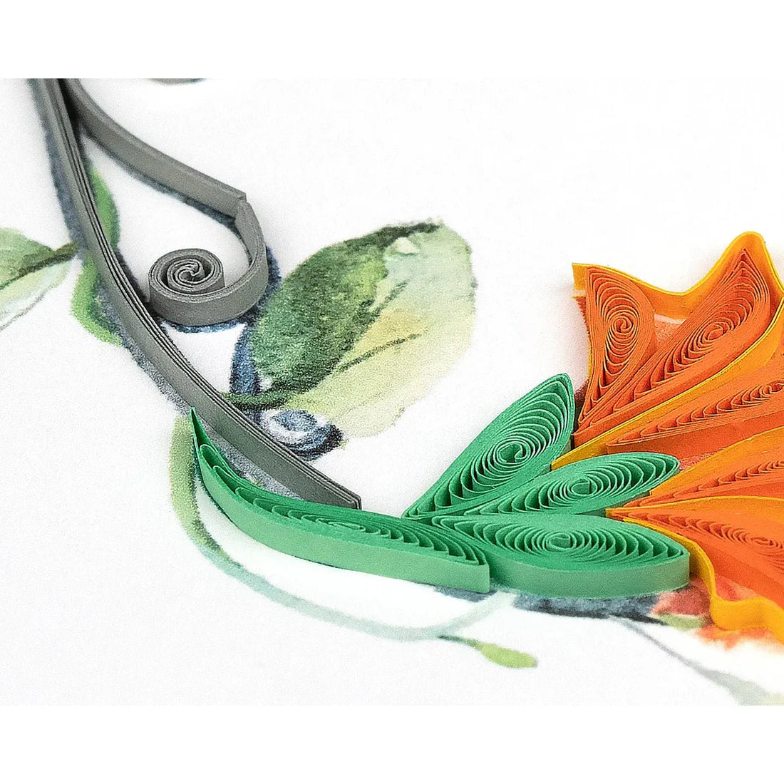 Quilled paper leaves in green and orange on a floral background - okotoks hc pharmacy