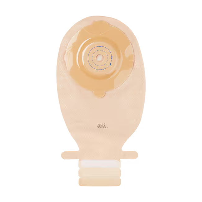 A beige plastic ostomy bag with a matching beige adhesive flap and a white connector collar at the bottom, shown against a plain white background. - okotoks hc pharmacy