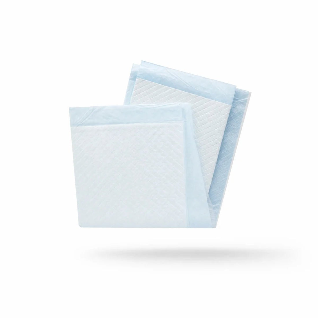 Two light blue and white absorbent pads floating on a clean white background with a soft shadow underneath. - okotoks hc pharmacy