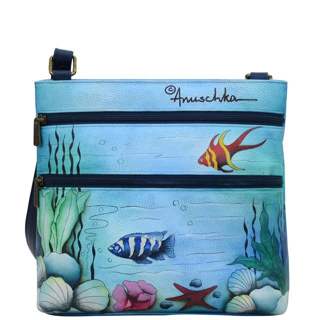 Hand-painted bag with underwater scene design featuring fish and sea creatures, branded 'Anuschka'. - okotoks hc pharmacy
