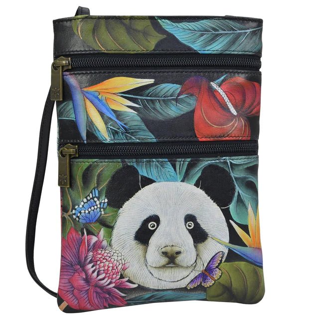 Crossbody bag with panda design and colorful leaves on a white background - okotoks hc pharmacy