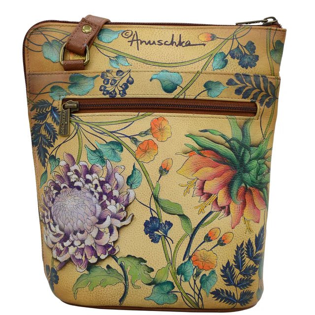 Floral-patterned handbag with 'Anuschka' branding on a beige background - okotoks hc pharmacy
