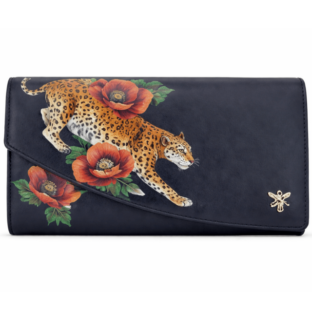 clutch bag with a leopard and floral design on a white background