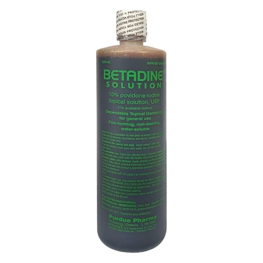 Bottle of Betadine Solution with Purdue Pharma branding on a white background - Okotoks HC Pharmacy