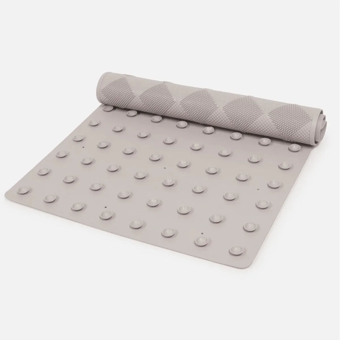 Gray textured mat with a rolled-up version on a white background - okotoks hc pharmacy