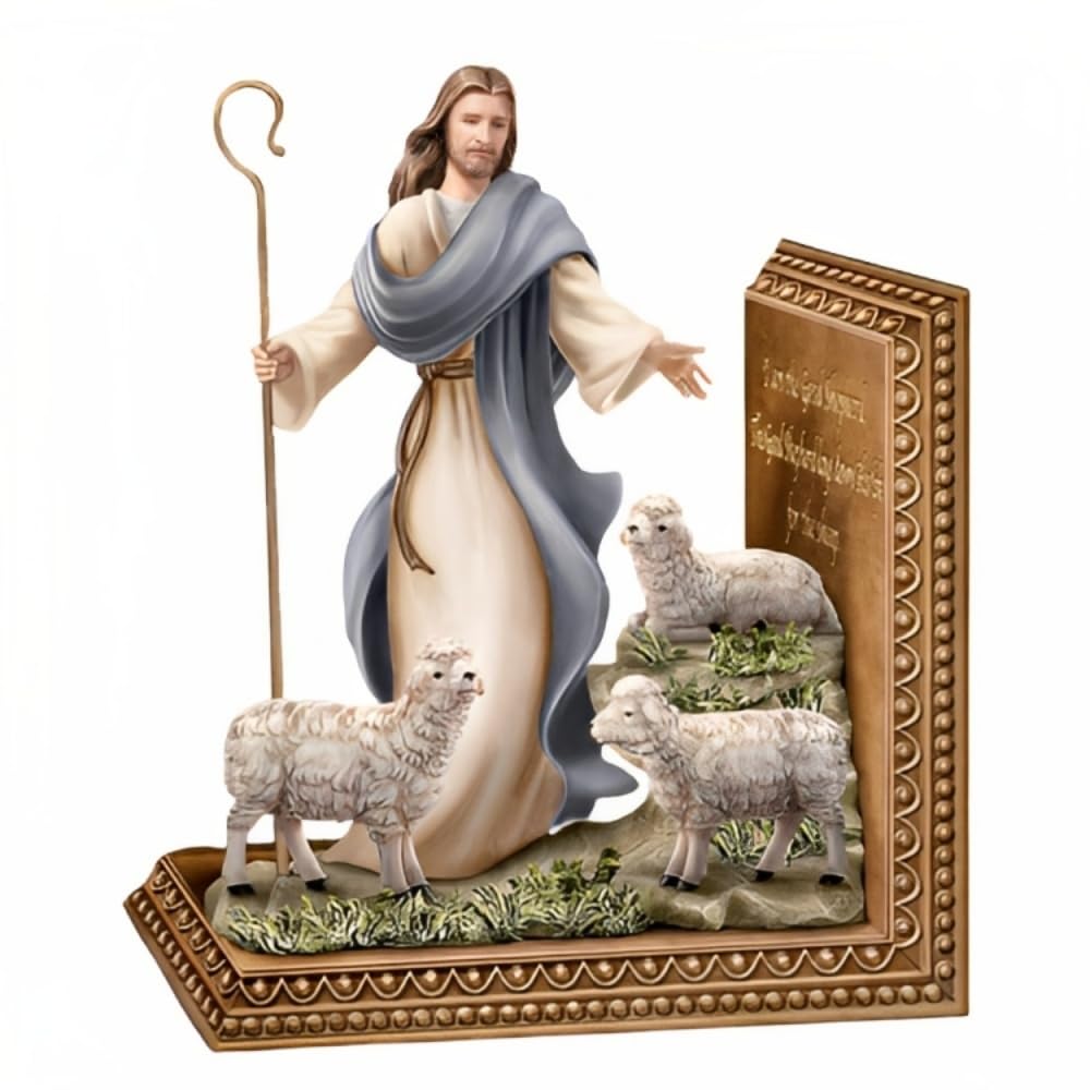 Statue of a Jesus figure with shepherds and sheep on a decorative base - okotoks hc pharmacy