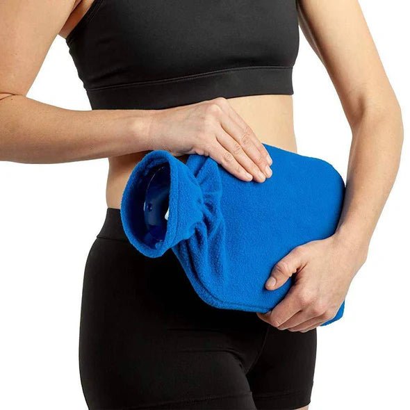 Person holding a blue ice pack against their stomach - okotoks hc pharmacy