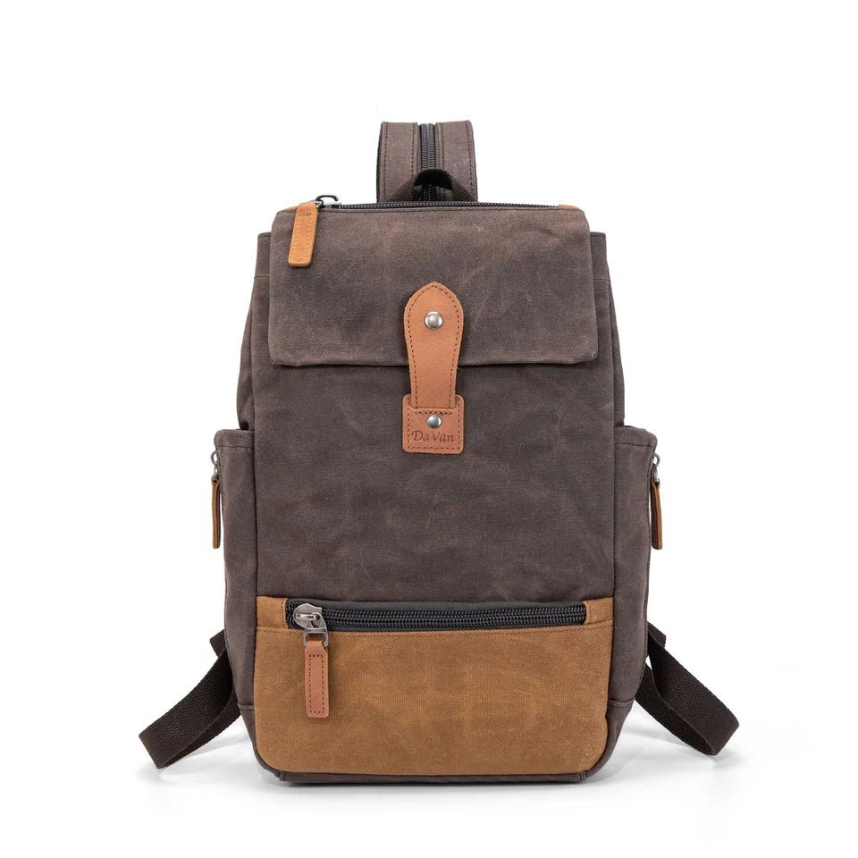 Brown and beige backpack with leather accents on a white background - okotoks hc pharmacy