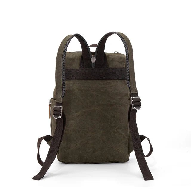 Green backpack with brown straps on a white background - okotoks hc pharmacy