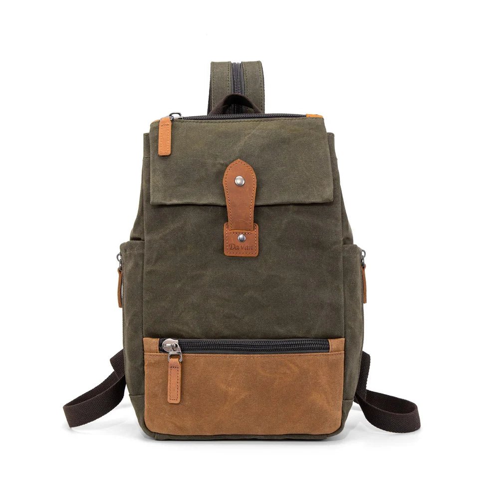 Green and brown backpack with leather accents on a white background - okotoks hc pharmacy