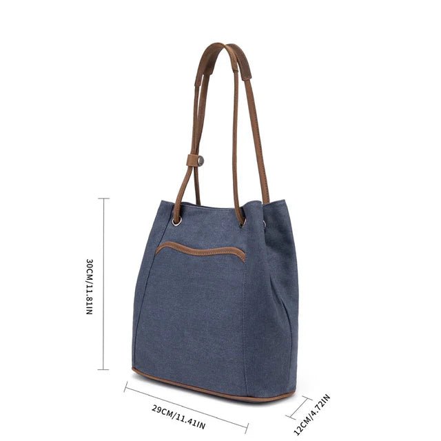 Blue tote bag with brown accents and measurements on a white background - okotoks hc pharmacy