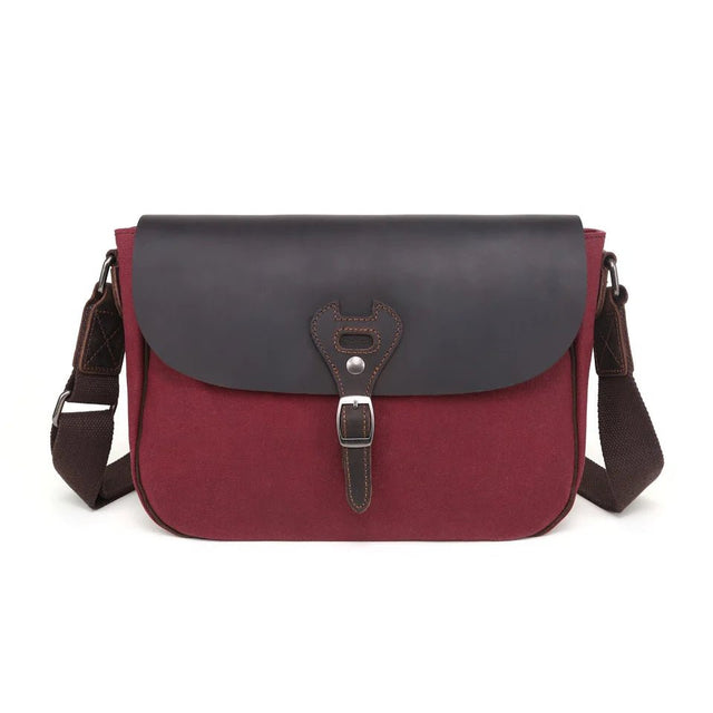 Red and black leather satchel bag on a white background - okotoks hc pharmacy