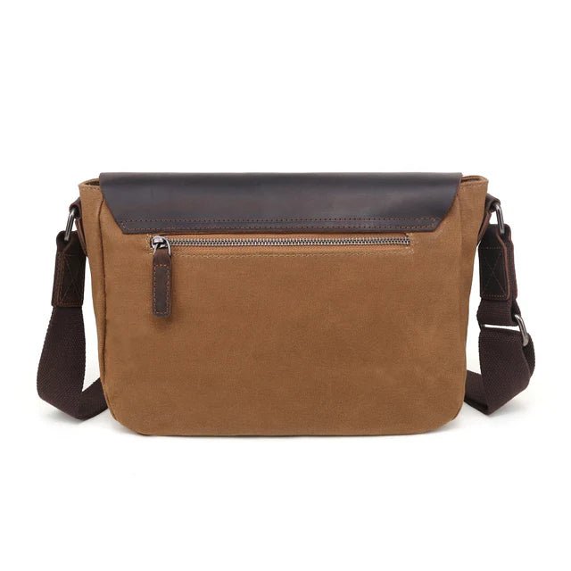 Brown leather shoulder bag with a dark brown flap on a white background - okotoks hc pharmacy