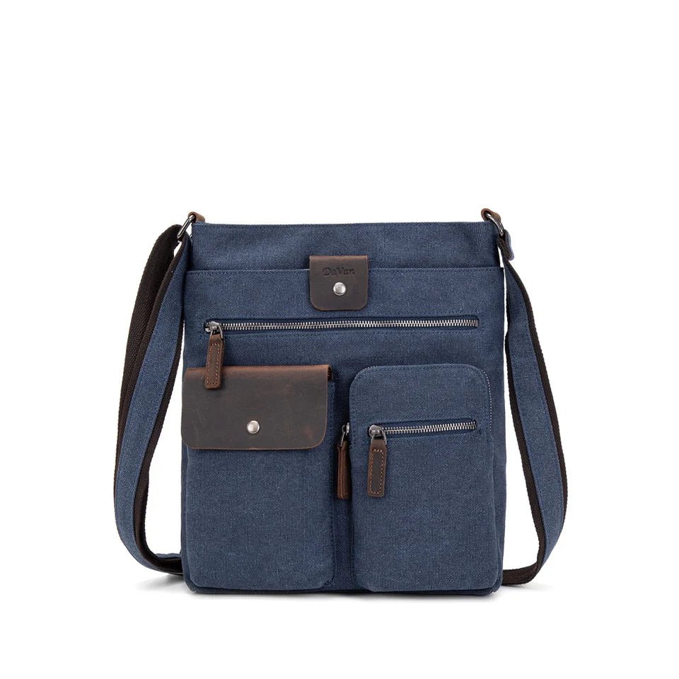 Blue crossbody bag with brown accents on a white background - okotoks hc pharmacy