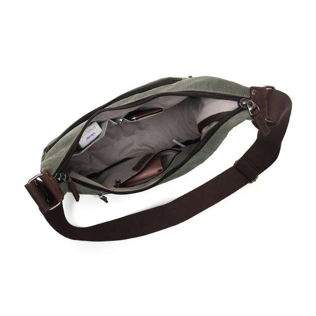 Green bag with brown strap on a white background - okotoks hc pharmacy