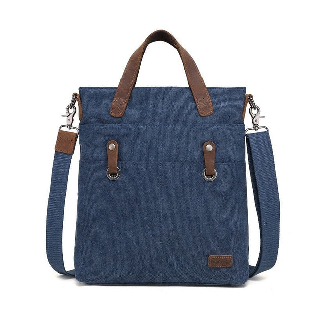 Blue bag with brown handles and straps on a white background - okotoks hc pharmacy