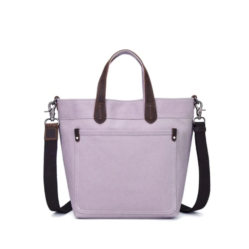 Purple tote bag with brown handles and black straps on a white background - okotoks hc pharmacy