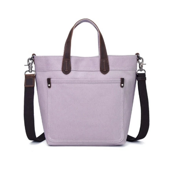 Purple tote bag with brown handles and black straps on a white background - okotoks hc pharmacy