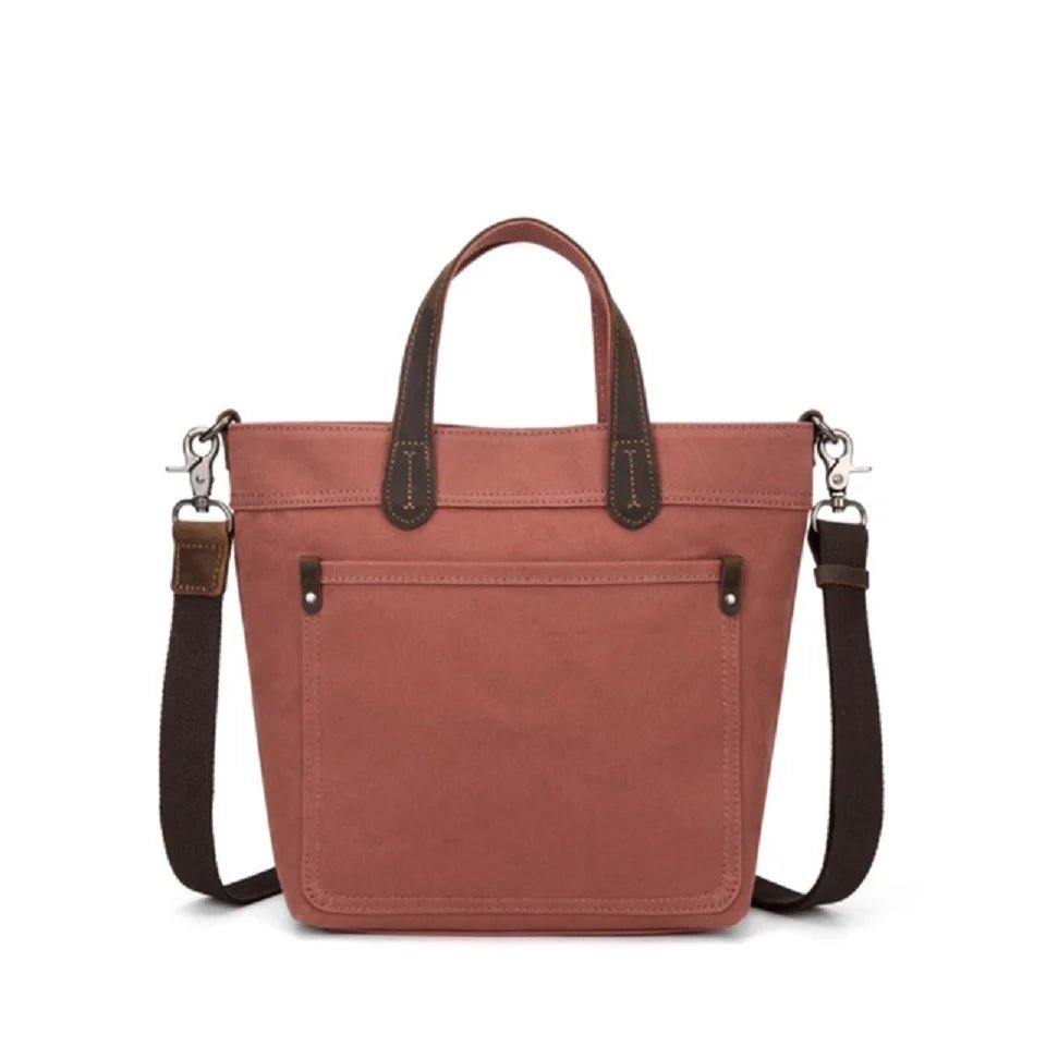 Brown leather handbag with a shoulder strap on a white background - okotoks hc pharmacy