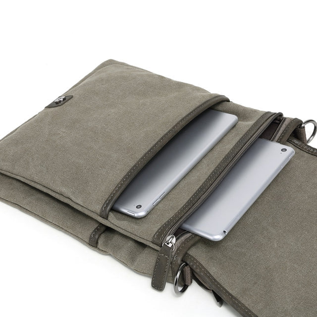 Brown fabric pouch with a zipper, containing a silver tablet and phone, on a white background. - okotoks hc pharmacy