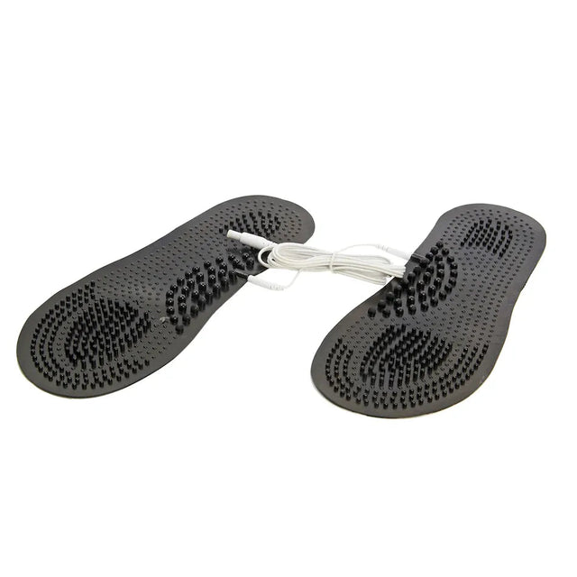 Pair of black foot-shaped insoles with a white cable on a white background - okotoks hc pharmacy