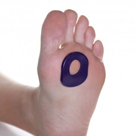 Purple gel pad on a foot against a white background - okotoks hc pharmacy