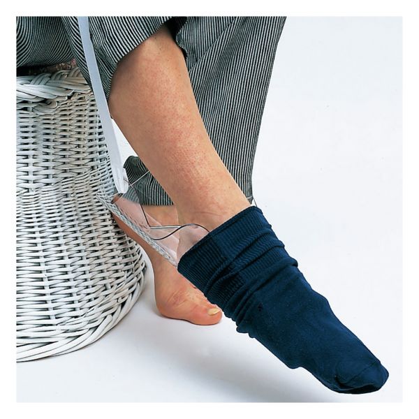 Person wearing a navy sock with a clear sandal on a white background - okotoks hc pharmacy