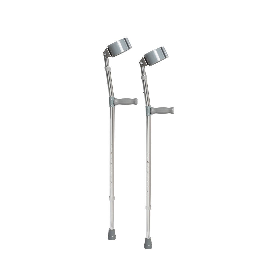 Pair of silver crutches on a white background - okotoks hc pharmacy