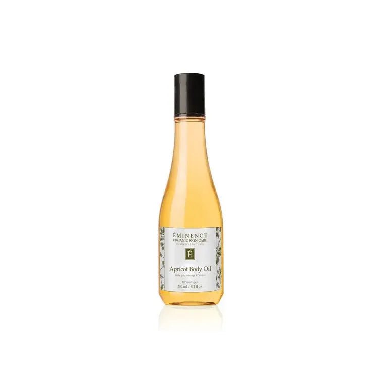 Bottle of Eminence Apricot Body Oil on a white background