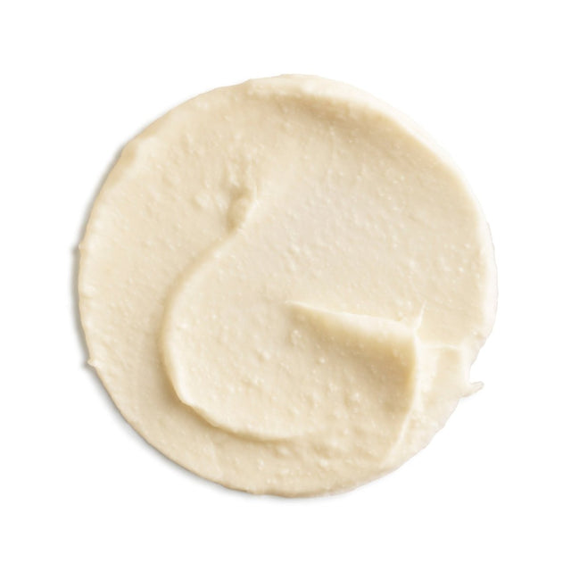 Close-up of a swirl of light beige cream on a white background - okotoks hc pharmacy