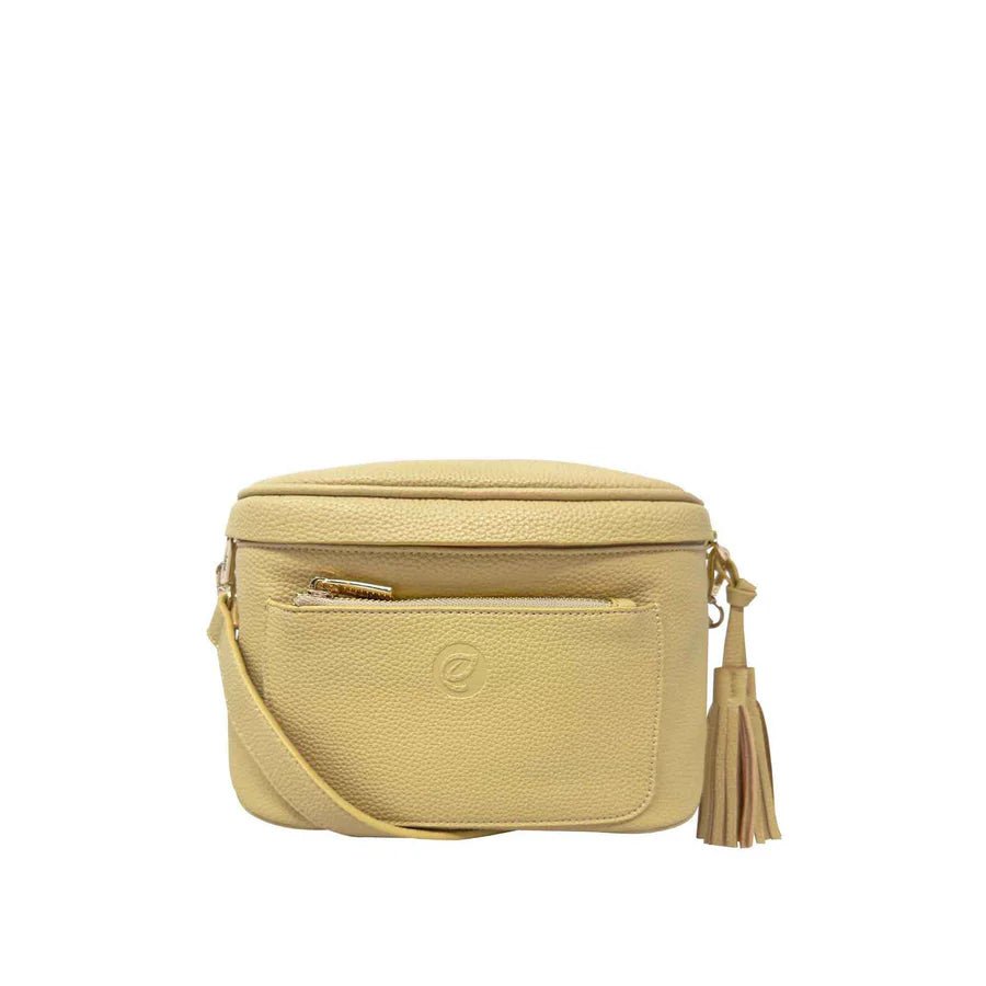 Yellow crossbody bag with a tassel on a white background - okotoks hc pharmacy