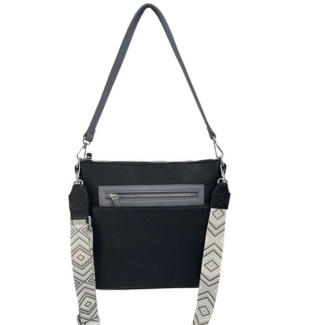 Black handbag with a patterned strap on a white background - okotoks hc pharmacy
