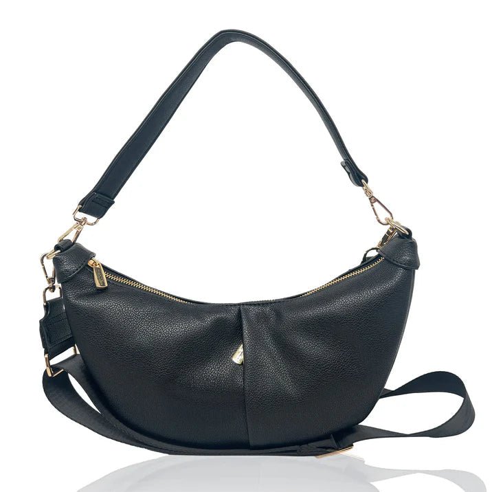 Black handbag with gold accents on a white background - okotoks hc pharmacy