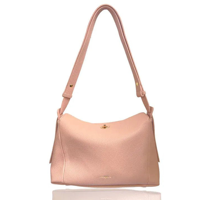Pink handbag with a strap on a white background - okotoks hc pharmacy