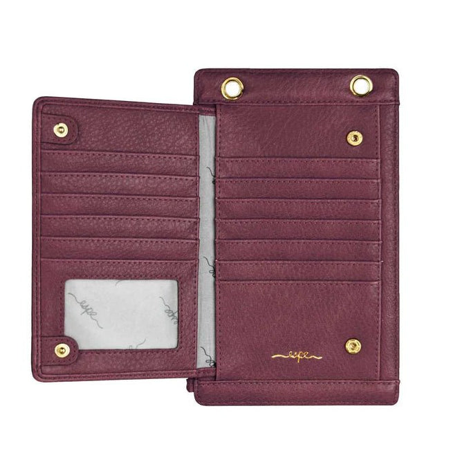 Open maroon wallet with gold accents on a white background - okotoks hc pharmacy