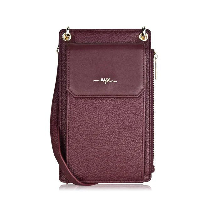 Purple crossbody bag with a visible brand logo on a white background - okotoks hc pharmacy