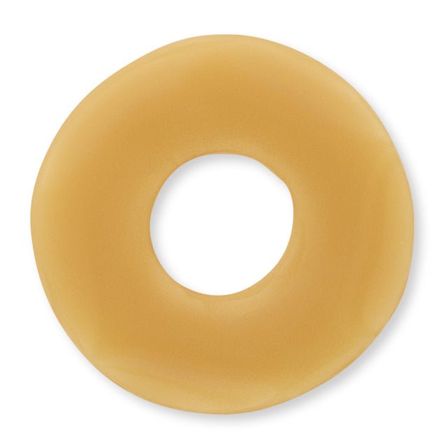 Yellow rubber ring on a white background - okotoks hc pharmacy