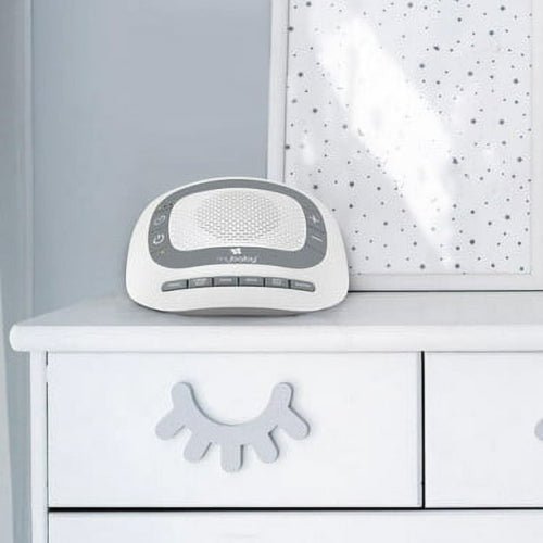 Baby monitor on a white dresser with a polka dot blanket in the background - okotoks hc pharmacy