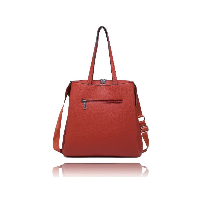 Red handbag with a strap on a white background - okotoks hc pharmacy