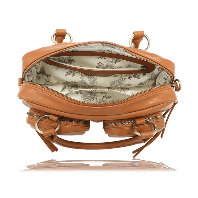 A tan leather shoulder bag shown open from the front, displaying its interior with a floral toile-patterned lining, multiple zippered compartments, and gold-tone hardware. - okotoks hc pharmacy