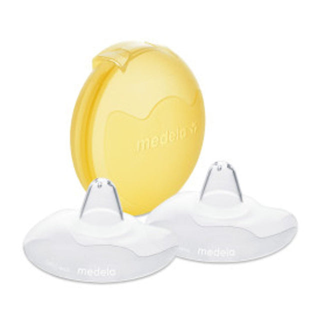 Yellow and white Medela breast pump parts on a white background - okotoks hc pharmacy
