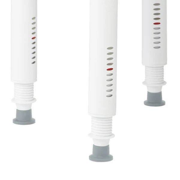 Three white cylindrical objects with gray bases on a white background - okotoks hc pharmacy