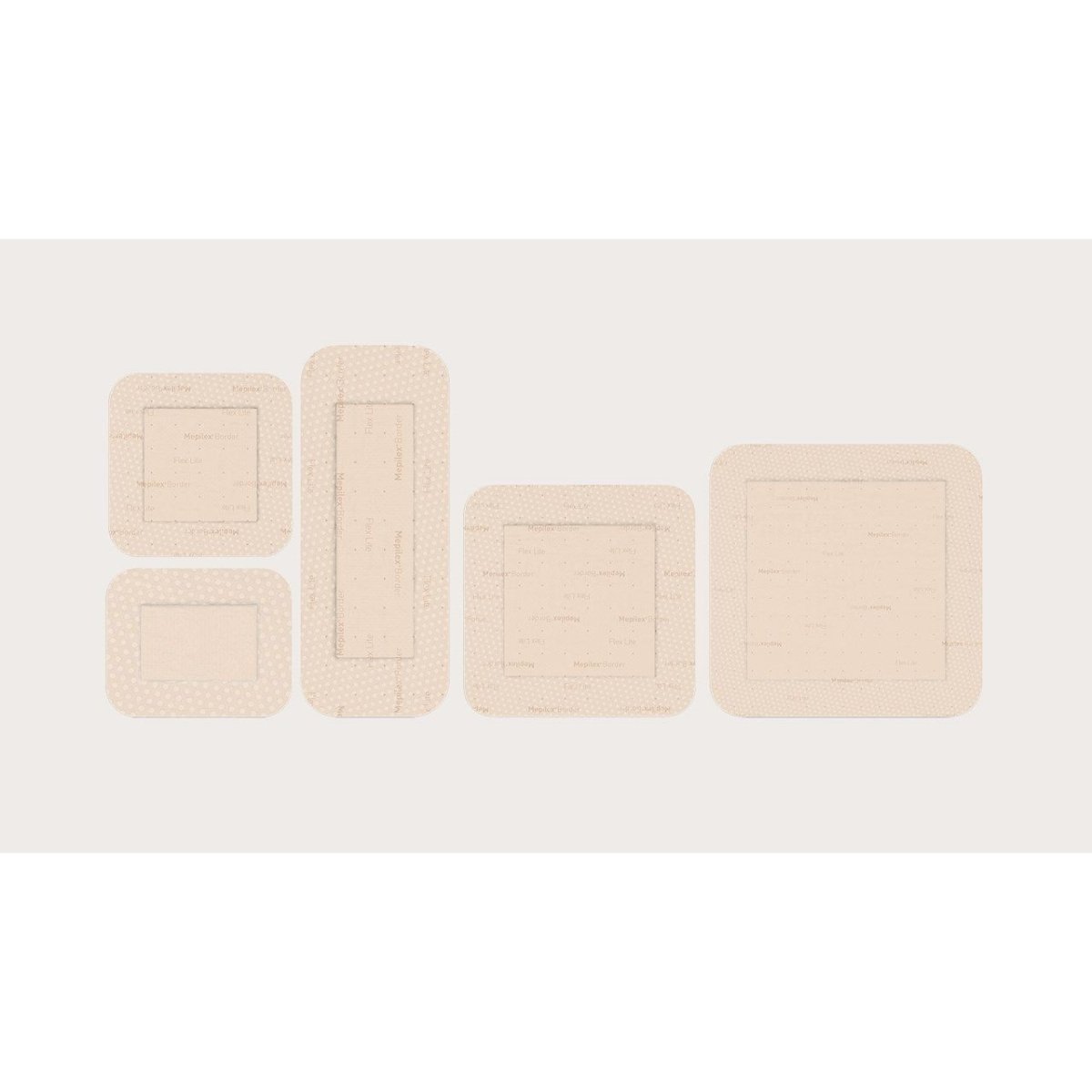 Set of five beige bandages of different sizes on a light beige background - okotoks hc pharmacy