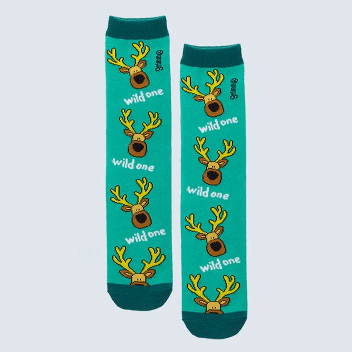 Teal socks with reindeer design and 'wild one' text on a light gray background - okotoks hc pharmacy